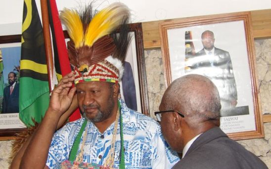 Vanuatu prime minister Charlot Salwai accepts traditional head dress from the United Liberation Movement for West Papua. Photo: Len Garae