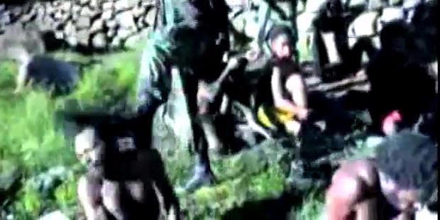 Cuplikan rekaman penyiksaan yang dialami satu warga Papua yang dituduh sebagai anggota OPM. Video yang disebarluaskan melalui situs Youtube ini dilansir oleh lembaga Asian Human Rights Commission.