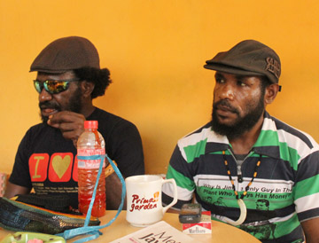 Ketua I Komite Nasional Papua Barat (KNPB), Mako Tabuni dan Anggota KNPB, Uchak Logo