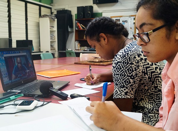 Student reporter Vilimaina Naqelevuki (left) and Wansolwara chief-of-staff Heather Traill interview Papua New Guinea journalist Alexander Rheeney about West Papua via Skype. Image: Wansolwara