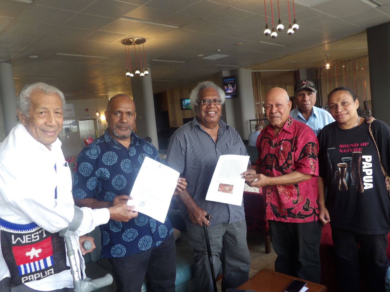 Faces of West Papua struggle from left to right: Andy Ayamiseba, Benny Wenda, Barak Sope, Rex Rumakiek, and Paula Makabory pose with final declarations